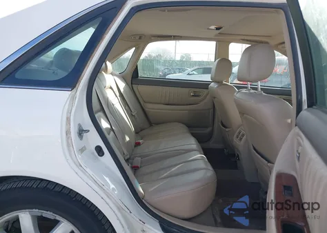 2001 Toyota Avalon Xls z USA, uszkodzony, nr VIN 4T1BF28BX1U193191